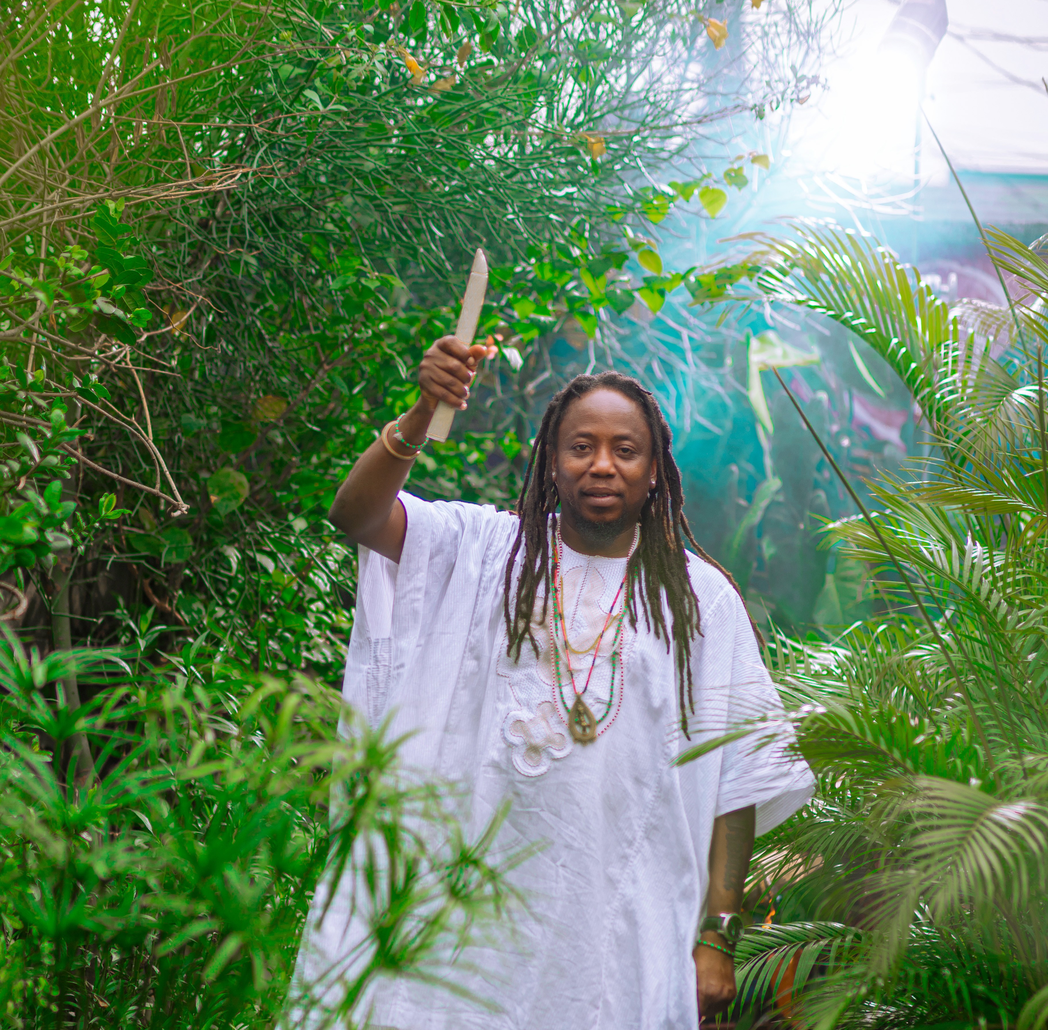 Picture of our Babalawo in the garden